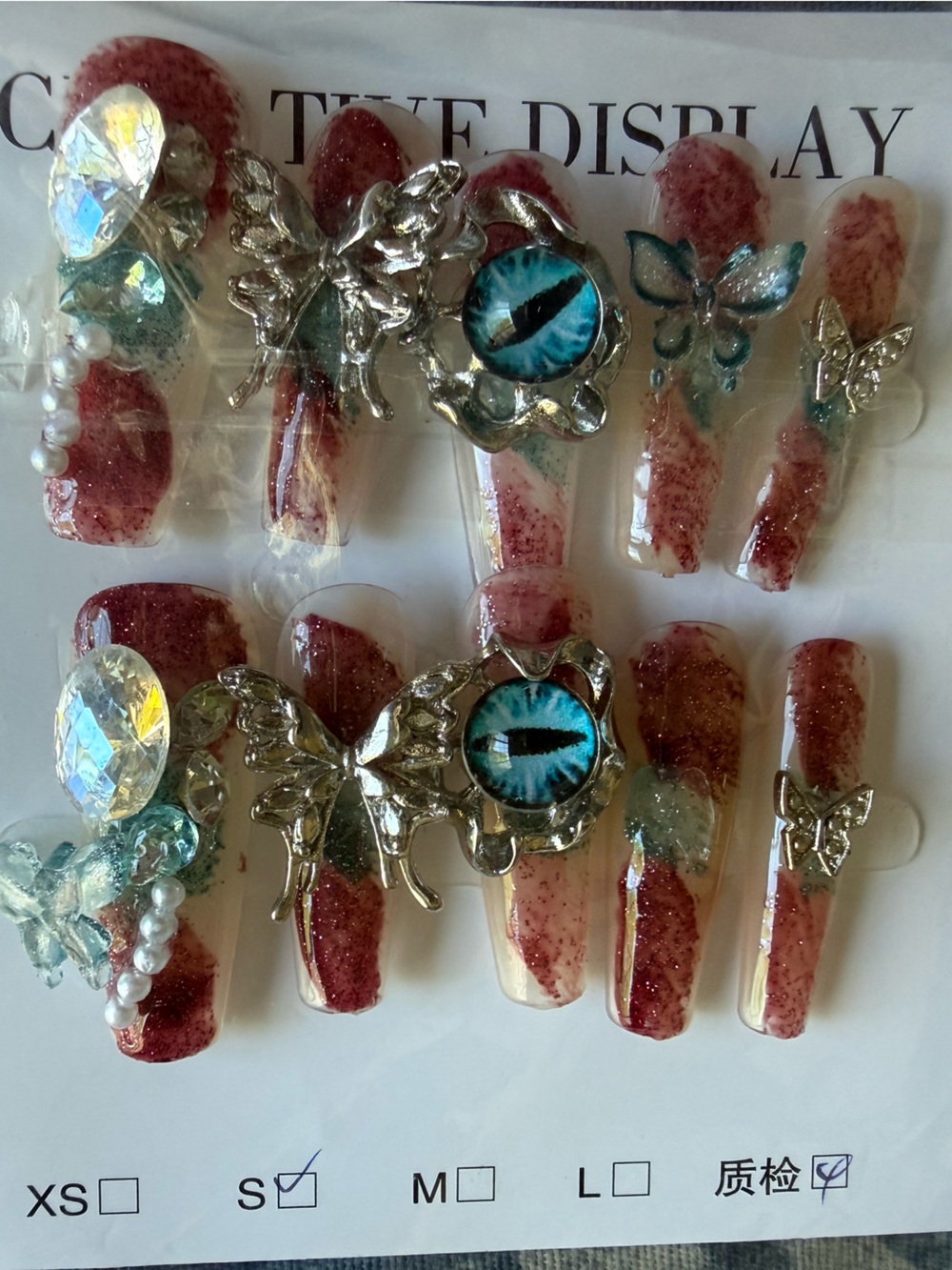 Handcrafted Red Glitter Press-On Nails with Blue Eye Accent - Unbranded